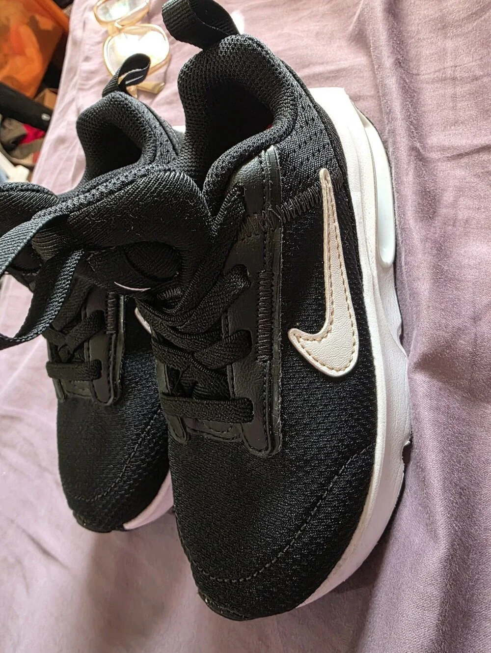 Nike Kids Black Sneakers with White Sole and Small Pink Swoosh
